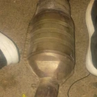 Two Ferrari Catalytic Converters 181967 Zeuna Starker New. Price: $700.00.