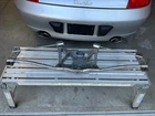 Porsche 987 Boxster Cayman Exhaust Carrier Support Bracket Hanger Free Key Chain Used. Price: $195.00.