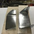 Corvette 1970-1973 Nos Rear Taillight Panel Exhaust Bezels Car Set (2PCS) New. Price: $400.00.