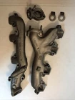 1967 1968 1969 Ford Mustang 390 Gt Exhaust Manifold Set W/ Spacer & Lift Hooks Used. Price: $1500.00.