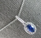 .91CT Diamond & Aaa Ceylon Sapphire 14KT White Gold Oval Halo Floating Pendant Pre-owned. Price: $2934.37.